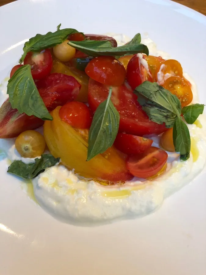 Burrata with heirloom tomatoes and basil