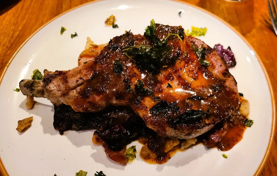 Wood-grilled pork chop at Ella's